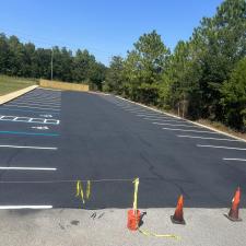 Transforming-Asphalt-Surfaces-Our-Seamless-Seal-Coating-Striping-and-Asphalt-Repair-Project-in-Milton-FL 1